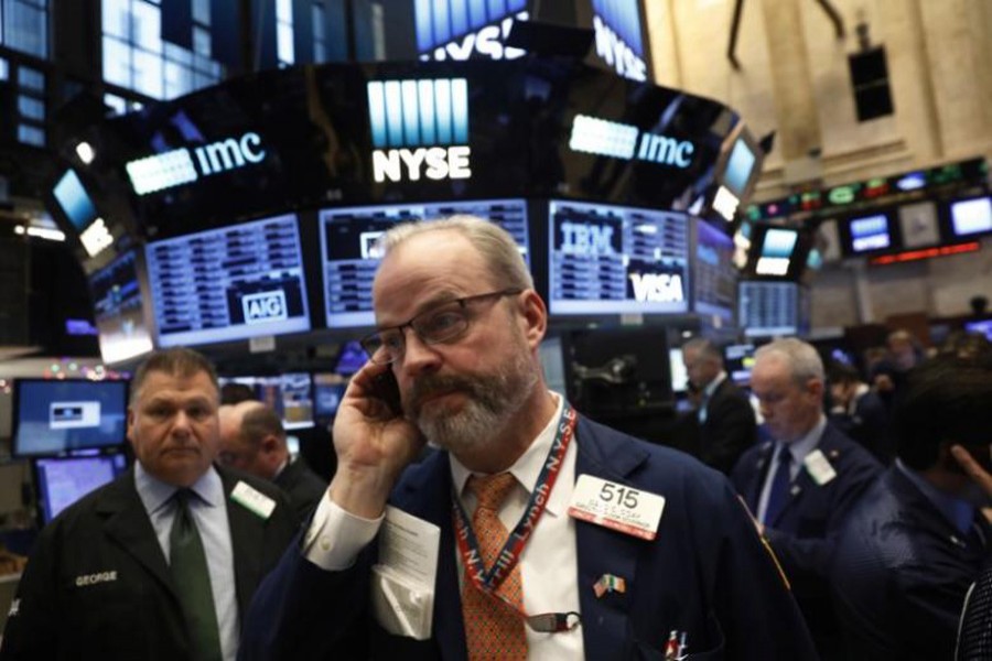 Traders work on the floor of the NYSE in New York, US, February 26. Reuters/File Photo