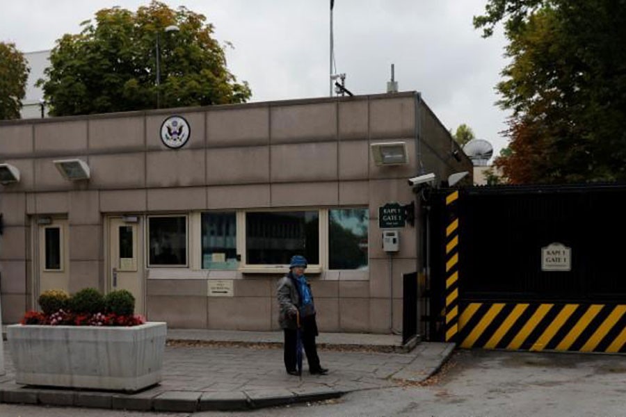 A woman walks past the US Embassy in Ankara, Turkey, October 9, 2017. Reuters file photo.