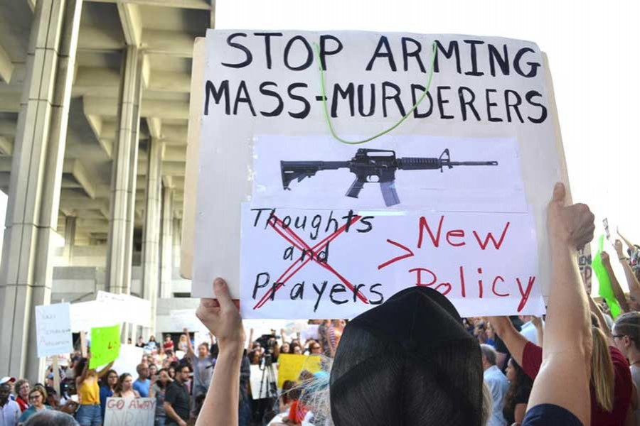 Hundreds showed up for an anti-gun violence rally in Parkland. Some in attendance were alumni who returned home to be with their community. Phoro credit: JESSICA BAKEMAN / WLRN