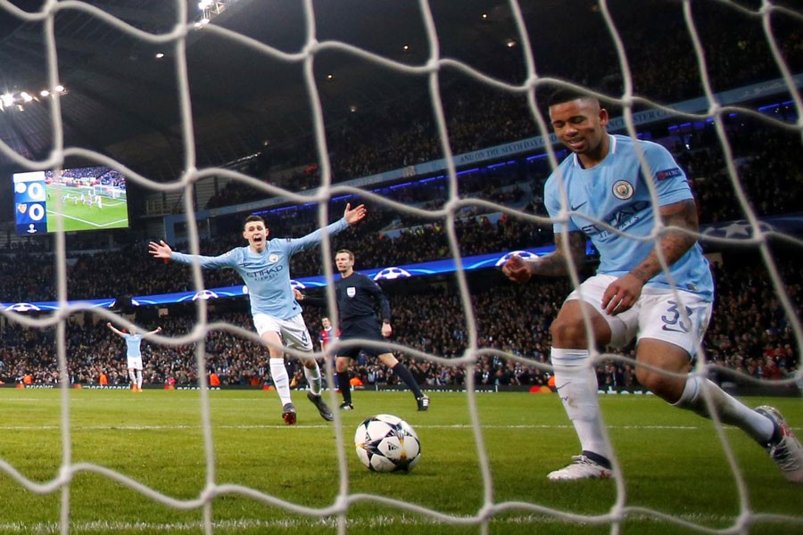 Champions League Round of 16 Second Leg - Manchester City vs FC Basel - Etihad Stadium, Manchester, Britain - March 7, 2018. Manchester City's Phil Foden celebrates after Gabriel Jesus scores their first goal. Reuters.