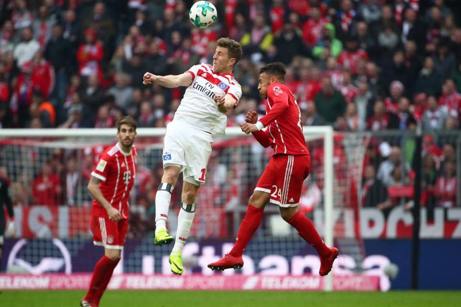 Bundesliga - Bayern Munich vs Hamburger SV - Allianz Arena, Munich, Germany - March 10, 2018 Hamburg’s Sven Schipplock in action with Bayern Munich's Corentin Tolisso. Reuters.