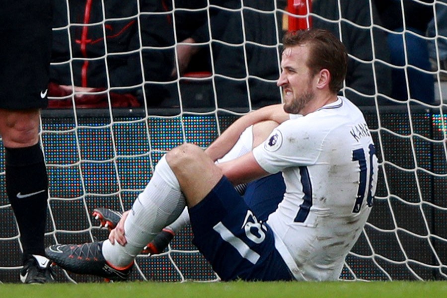 Tottenham’s Harry Kane sustains an injury after scoring a disallowed goal at the Vitality Stadium in Bournemouth on Sunday. - Reuters photo