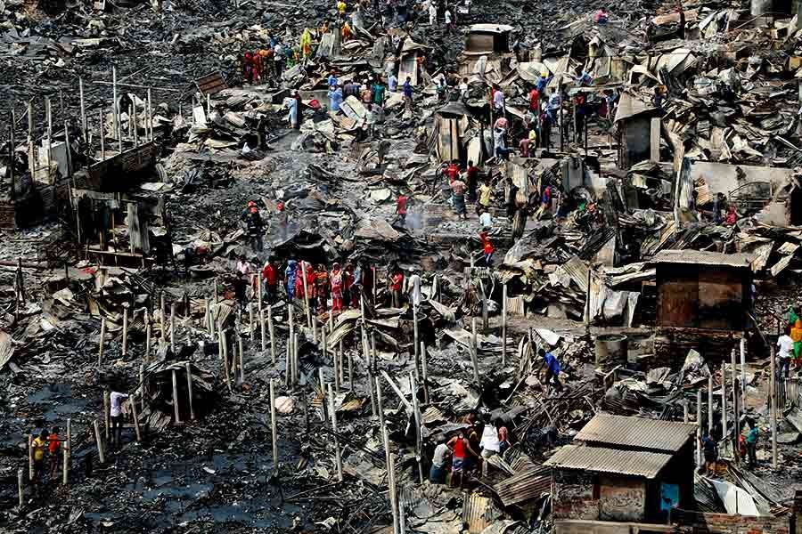 A recent fire at a slum in Mirpur section-12 area of Dhaka. -FE Photo