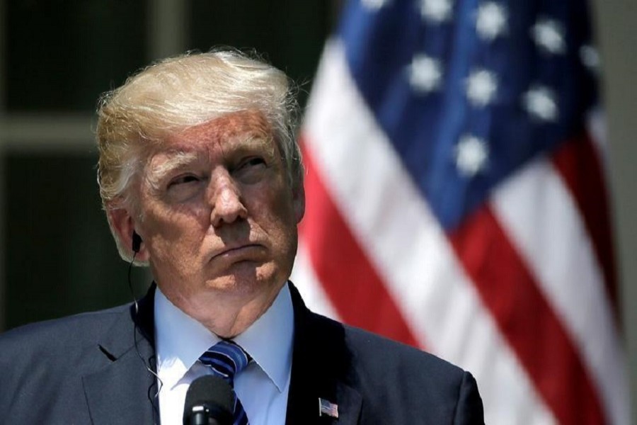 US President Donald Trump listens as South Korean President Moon Jae-in delivers a statement from the Rose Garden after meetings at the White House in Washington, US June 30, 2017. Reuters/Files