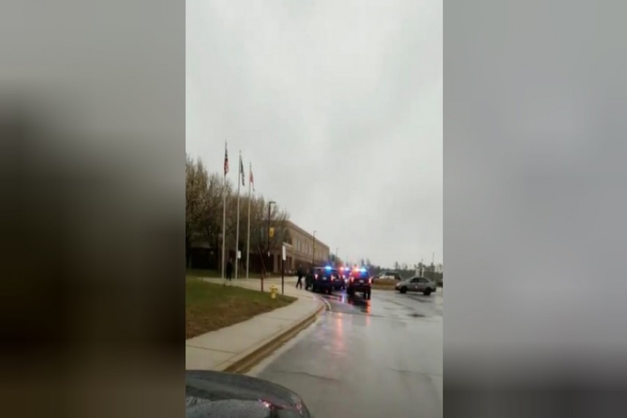 Law enforcement vehicles arrive at the Great Mills High School in Lexington Park, St. Mary's County, Maryland.  - Reuters