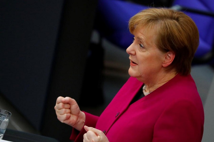 German Chancellor Angela Merkel addresses the lower house of parliament Bundestag in Berlin, Germany, March 21, 2018. Reuters