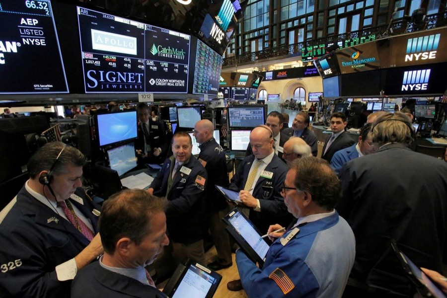 Traders work on the trading floor at the New York Stock Exchange in Manhattan, New York City, March 14, 2018. Reuters/Files