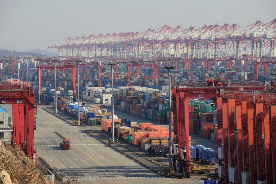 Containers are seen at the Yangshan Deep Water Port, part of the Shanghai Free Trade Zone, in Shanghai, China February 13, 2017. Reuters/Files