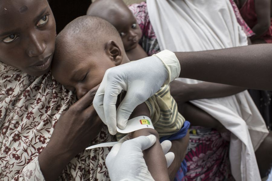 Amina, 20, holds her son, who has been suffering from fever and diarrhea in Nigeria. Source: Oxfam International