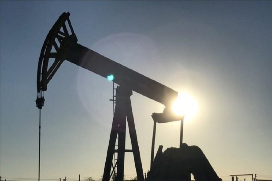 An oil pump is seen operating in the Permian Basin near Midland, Texas, US, May 3, 2017. Reuters/Files