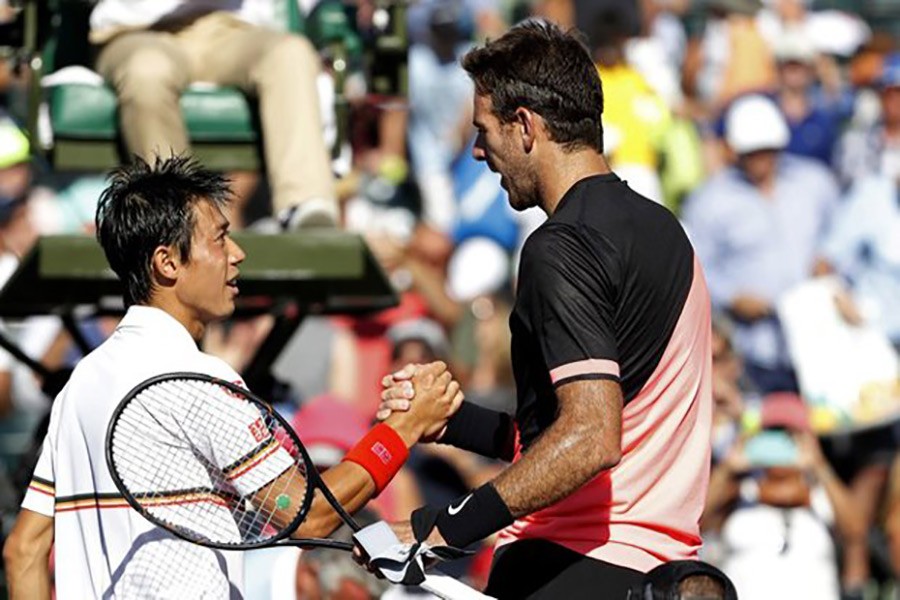 Juan Martin del Potro of Argentina (R) shakes hands with Kei Nishikori of Japan (L) after their match at Miami Open on Sunday - Reuters photo