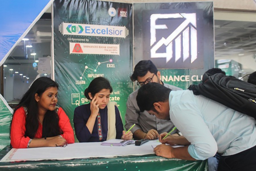 Participants seen at the NSU registration booth