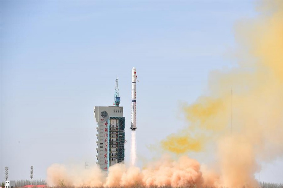 A Long March-4C rocket carrying the first group of China's Yaogan-31 remote sensing satellites and a micro nano technology experiment satellite is launched from Jiuquan Satellite Launch Center in northwest China's Gansu Province, April 10. Xinhua/File