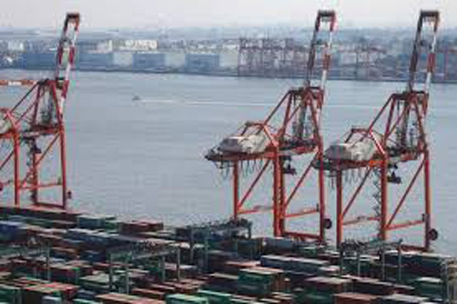 Shipping containers at a port in Tokyo, Japan  	— Reuters