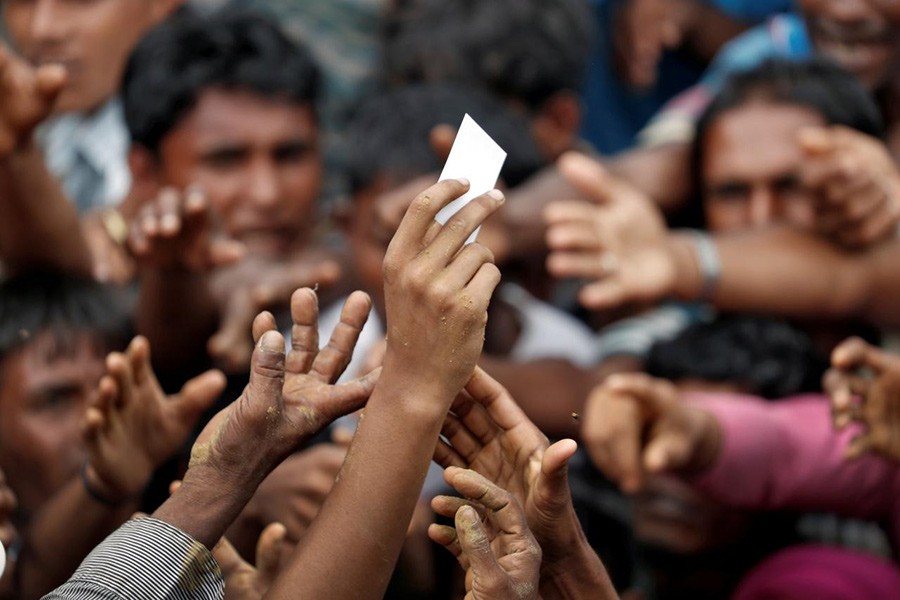 Rohingya refugees struggle to get aid in a camp in Cox's Bazar, Bangladesh, September 20 last - Reuters/File