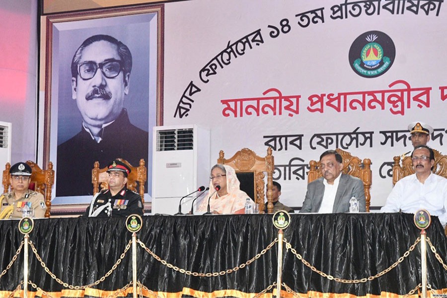 Prime Minister Sheikh Hasina addressing a function marking the 14th founding anniversary of RAB - Focus Bangla photo