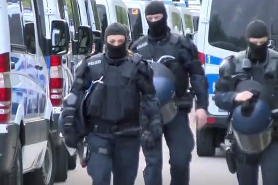 Police arrive at the migrants' home in Ellwangen, Germany on Thursday - Screenshot taken from Reuters TV (via Reuters)