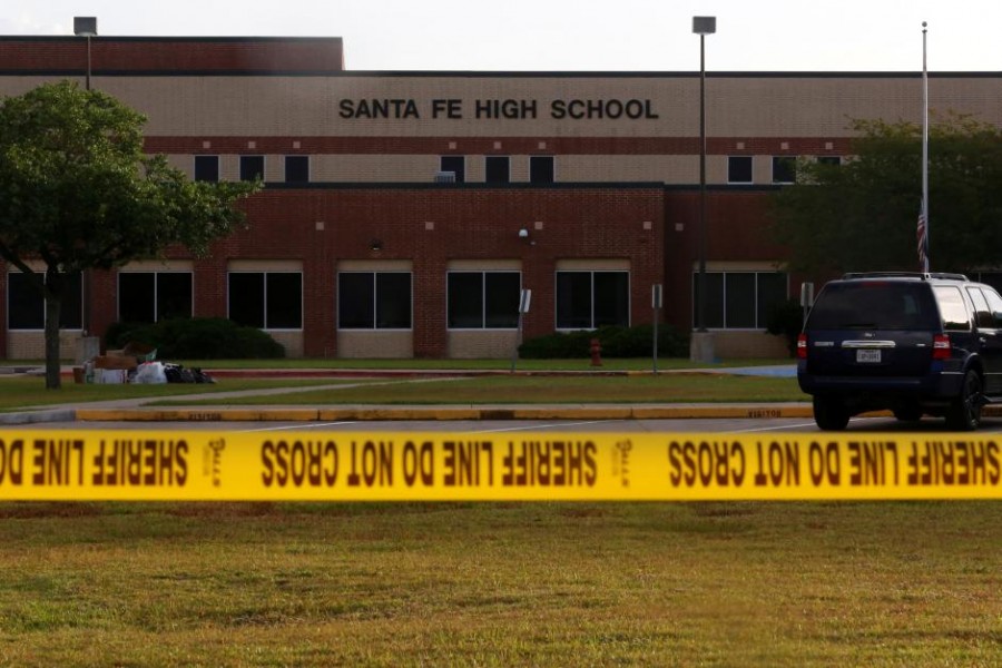 Police tape is seen near the site of the shooting at the Santa Fe High School in Santa Fe, Texas, US, May 20, 2018. Reuters.