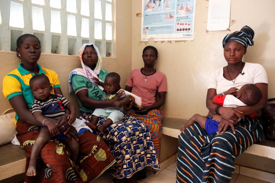 Women attend a family planning course given by a nurse from the NGO Marie Stopes at a dispensary in the village of Nedgo, near Ouagadougou, Burkina Faso February 16. Reuters/File