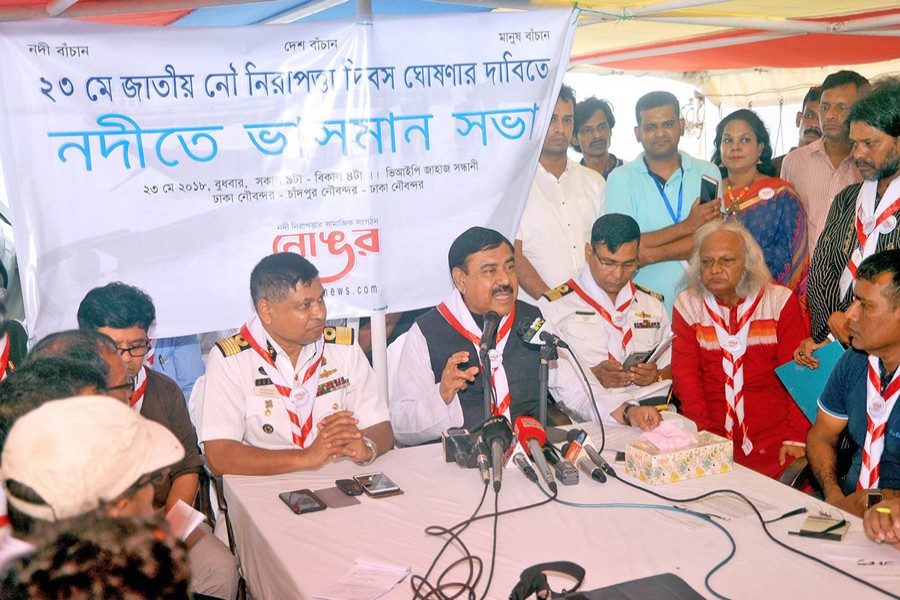 Shipping Minister Shajahan Khan speaking at a discussion  aboard a vessel in the river Buriganga Wednesday 	— PID Photo