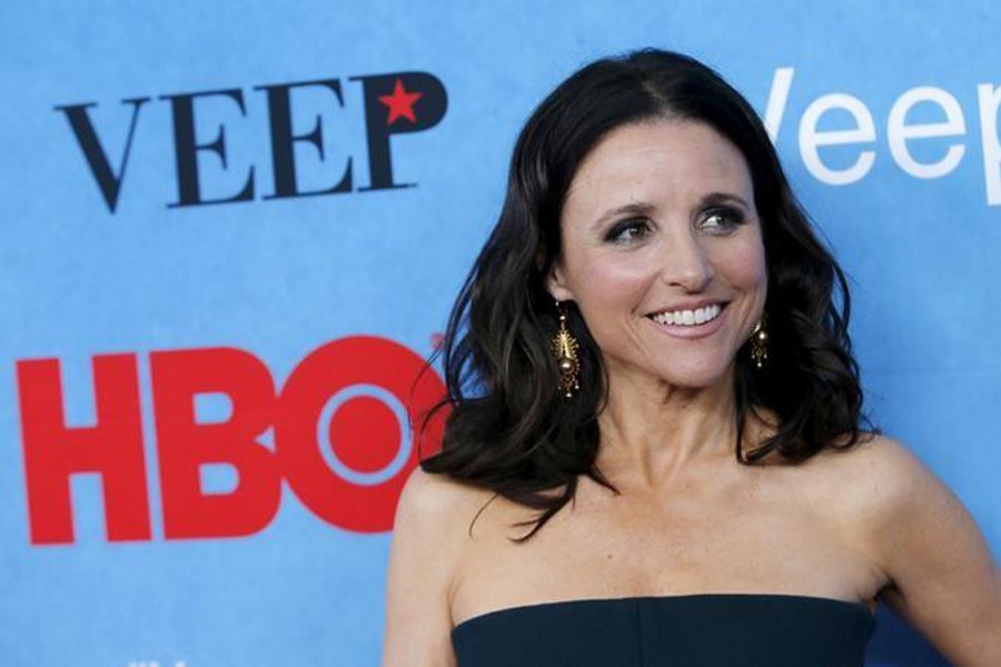 Actress Julia Louis-Dreyfus poses for photographers as she arrives for the New York Premiere of the fourth season of the HBO television series "VEEP" in New York City April 6, 2015. Reuters/File