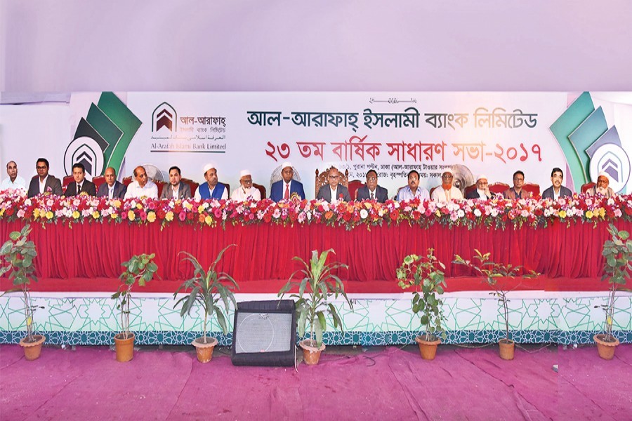 Al-Arafah Islami Bank Limited Chairman Abdus Samad Labu and Managing Director Md Habibur Rahman on the dais at the bank's 23rd AGM in the capital on Thursday