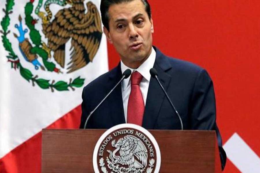 Mexican President Enrique Pena Nieto gives a speech during a ceremony of a global tour of the FIFA World Cup trophy, at Los Pinos presidential residence in Mexico City, Mexico, April 11, 2018. Reuters/Files