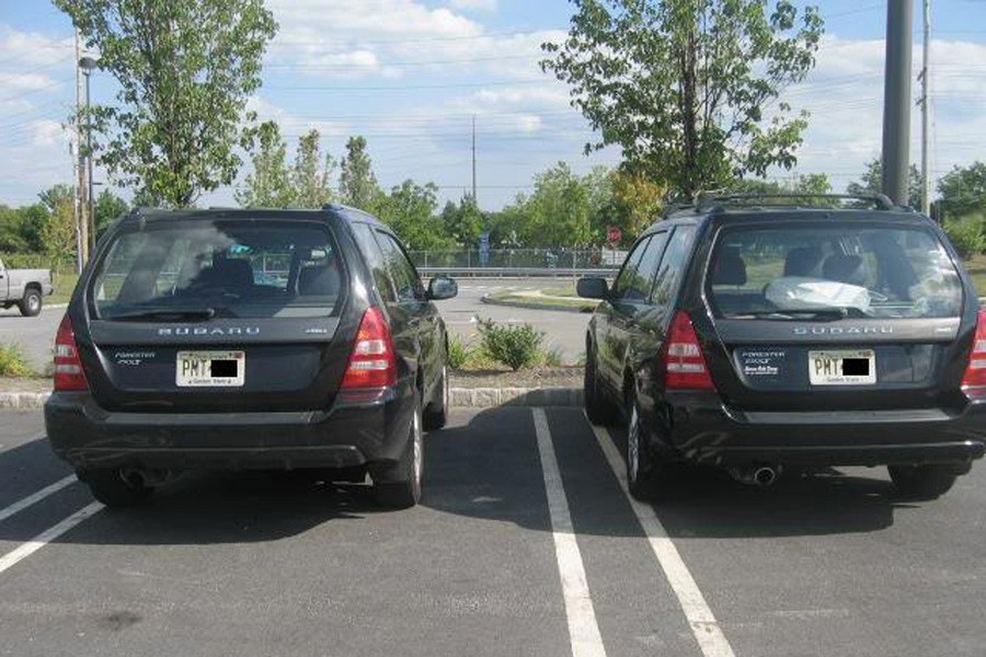 Cars parked under sunlight