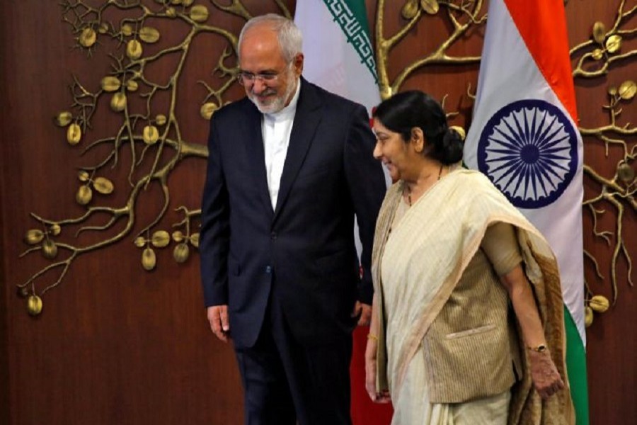 Iran's Foreign Minister Mohammad Javad Zarif and his Indian counterpart Sushma Swaraj walk after a photo opportunity in New Delhi, India, May 28, 2018. Reuters/Files