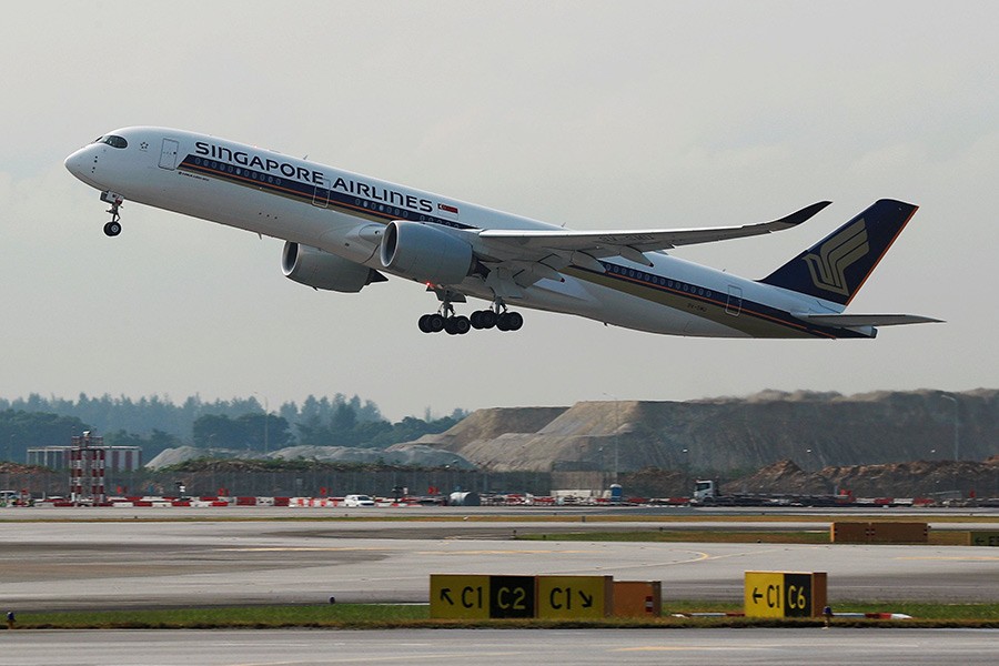 A Singapore Airlines Airbus A350-900 plane takes off at Changi Airport in Singapore on March 28 last - Reuters/File