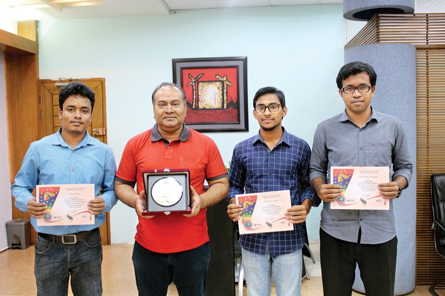 Team Luminous along with Professor Shibli Rubayat Ul Islam, dean, Faculty of Business Studies, University of Dhaka with their prize and certificates