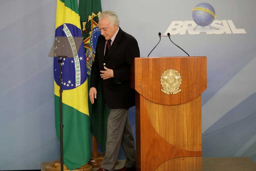 Brazil's President Michel Temer walks after a press statement at Planalto Palace, in Brasilia, Brazil, June 1, 2018. Reuters