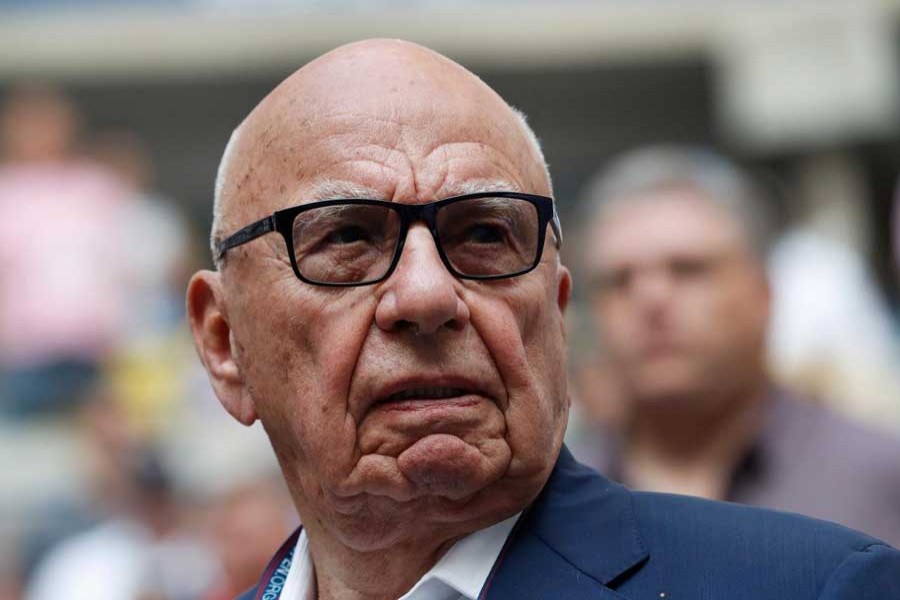 Tennis - US Open - Mens Final - New York, US - September 10, 2017 - Rupert Murdoch, Chairman of Fox News Channel stands before Rafael Nadal of Spain plays against Kevin Anderson of South Africa. Reuters.