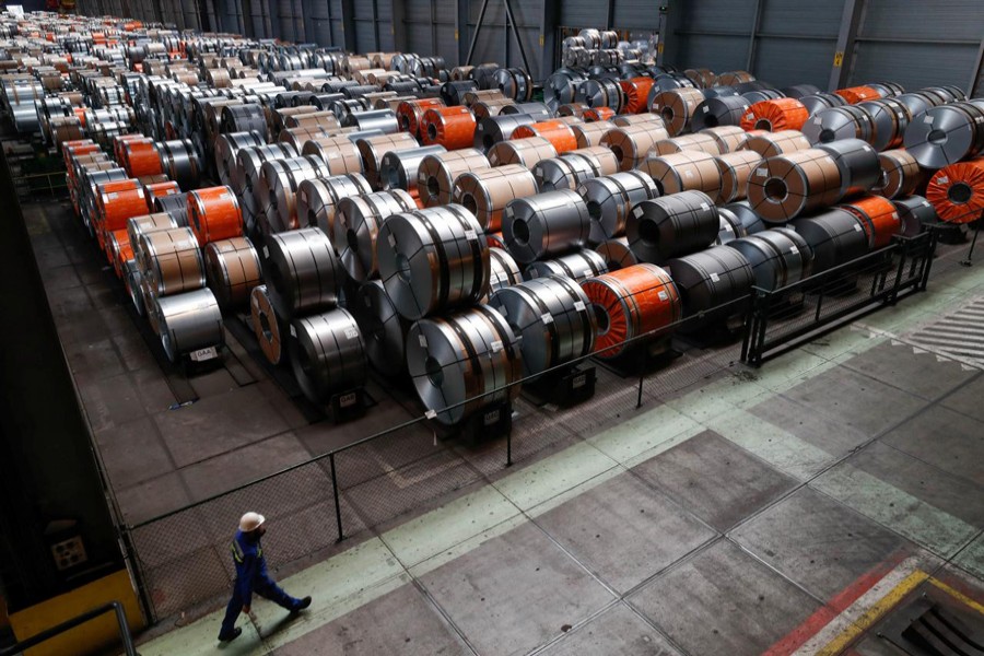 Metal coils are seen at ArcelorMittal steel plant in Ghent, Belgium 	— Reuters