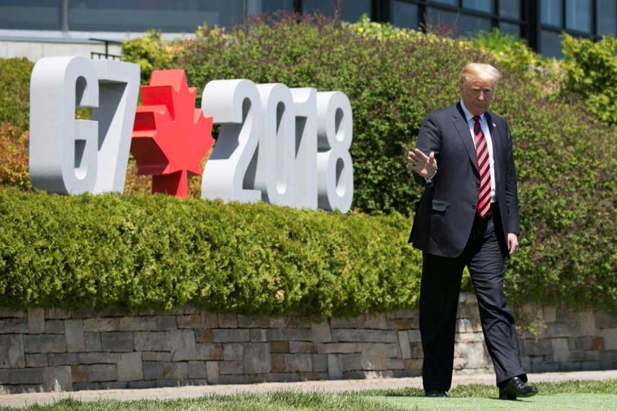 US President Donald Trump arrives for the official welcoming ceremony the G7 Summit in the Charlevoix town of La Malbaie, Quebec, Canada, June 8, 2018. Reuters/Files