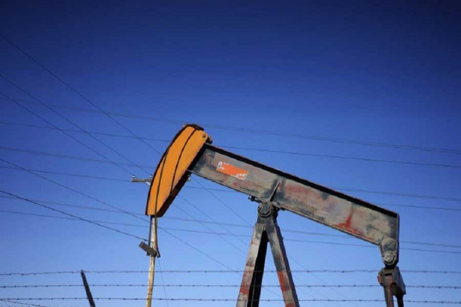 An oil well pump jack is seen at an oil field supply yard near Denver, Colorado, US, February 2, 2015. Reuters/File Photo