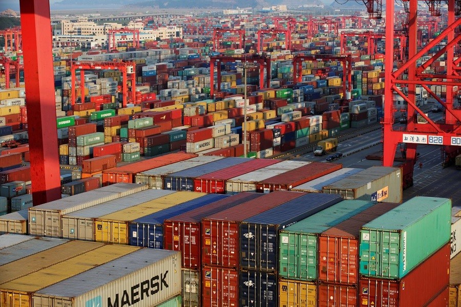 Containers are seen at the Yangshan Deep Water Port, part of the Shanghai Free Trade Zone, in Shanghai, China September 24, 2016. Reuters/Files