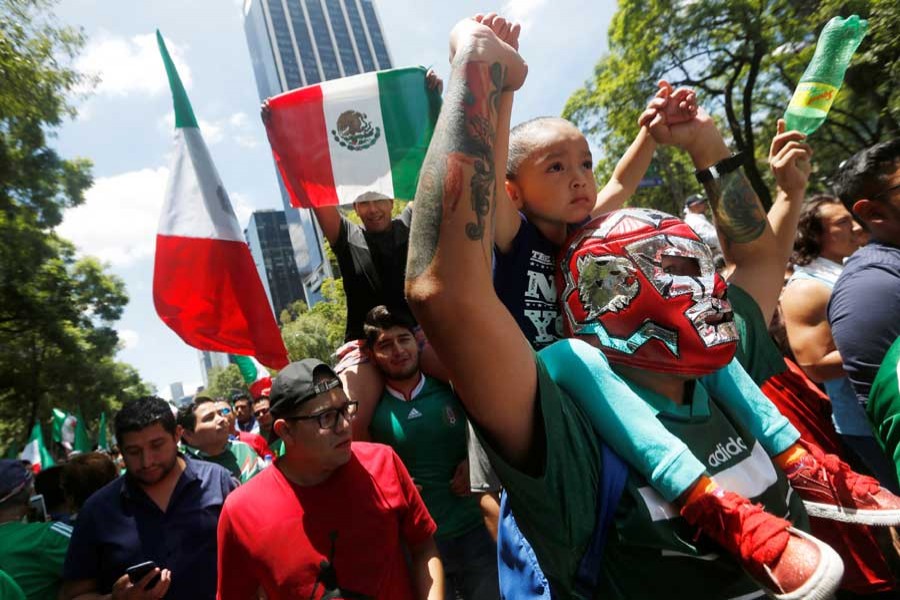 Football - World Cup - Group F - Germany vs Mexico - Moscow, Russia - June 17, 2018 Mexico's fans celebrate victory of their team after the match. Reuters/Files