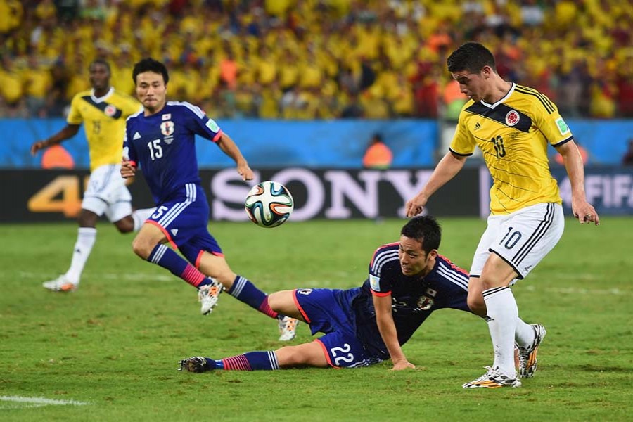 Japan downs 10-man Colombia