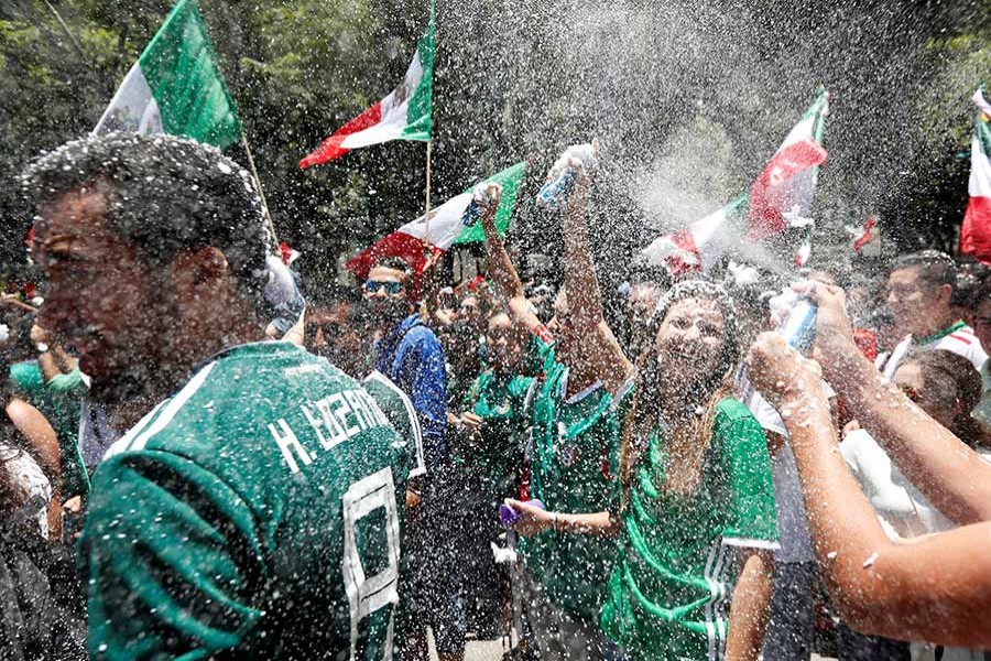 Mexican fans celebrate at the Angel of Independence monument after win over mighty Germany - Reuters photo