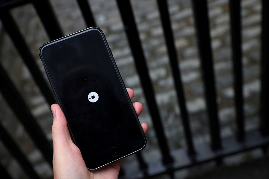 The Uber logo is seen on mobile telephone in London, Britain on September 25 last - Reuters/File