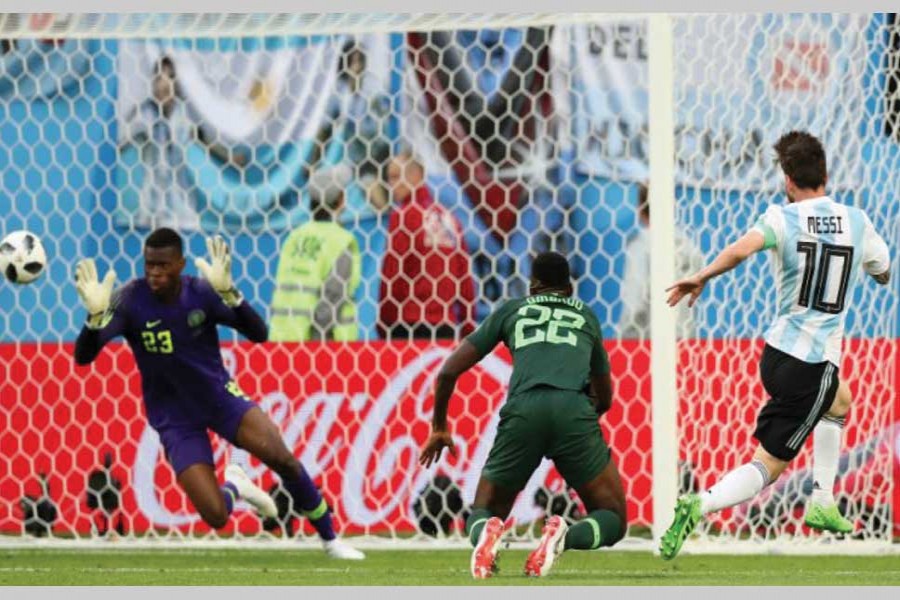 Lionel Messi of Argentina scores 100th goal of 2018 FIFA World Cup with his strike against Nigeria during late Tuesday's match.