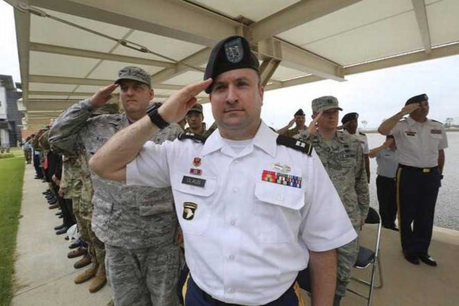 US Army soldiers salute during an opening ceremony for the new headquarters of the US Forces Korea (USFK) at Camp Humphreys in Pyeongtaek, South Korea, on Friday.   –AP