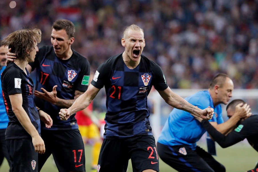 Croatia's Domagoj Vida celebrates his team's penalty shootout victory over Denmark. Photo: Reuters.