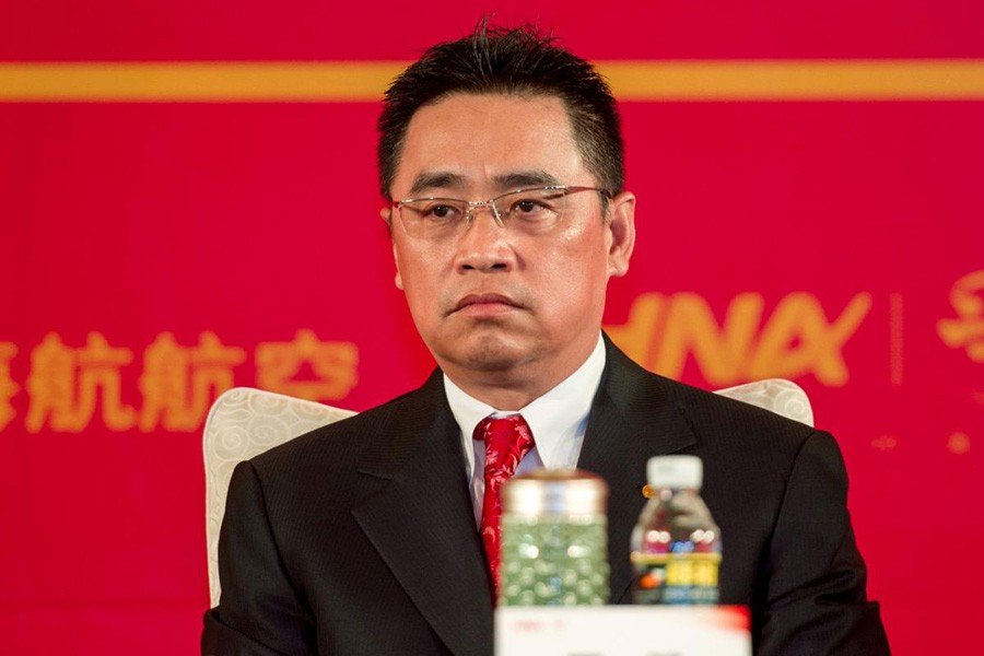 Wang Jian, Co-Chairman of HNA Group, attends a meeting marking the 20th anniversary of the company's founding in Haikou, Hainan province, China, April 28, 2013. Reuters/Files