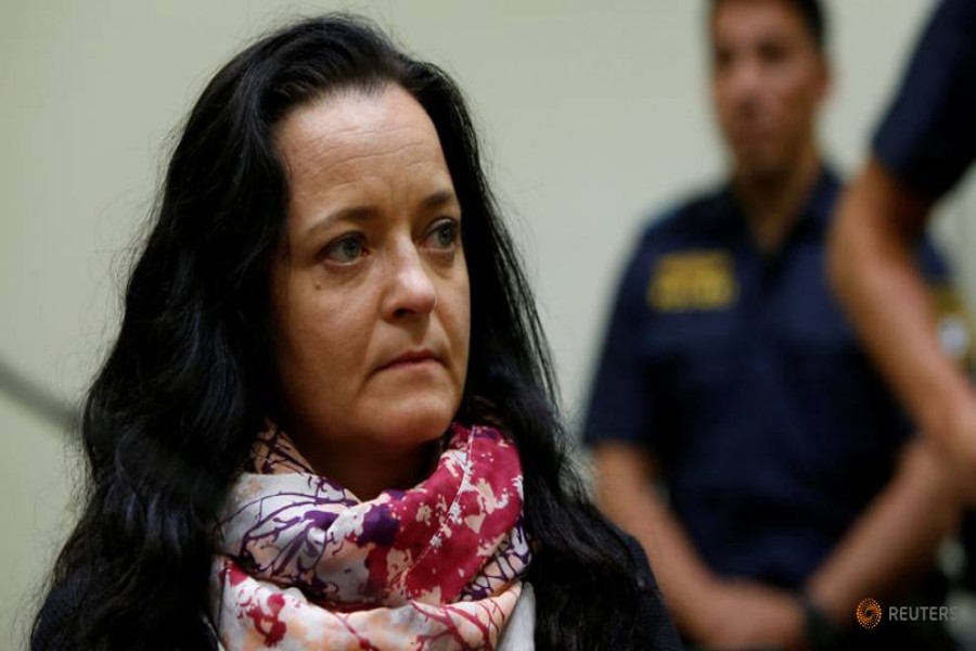 Defendant Beate Zschaepe waits in a Munich courtroom before judges give their verdict in the trial of suspected NSU neo-Nazi gang member Zschaepe in Munich, Germany July 11, 2018 - Reuters