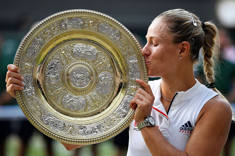 Germany's Angelique Kerber kisses the Wimbledon trophy after winning the women's singles final against Serena Williams of the US — Reuters photo