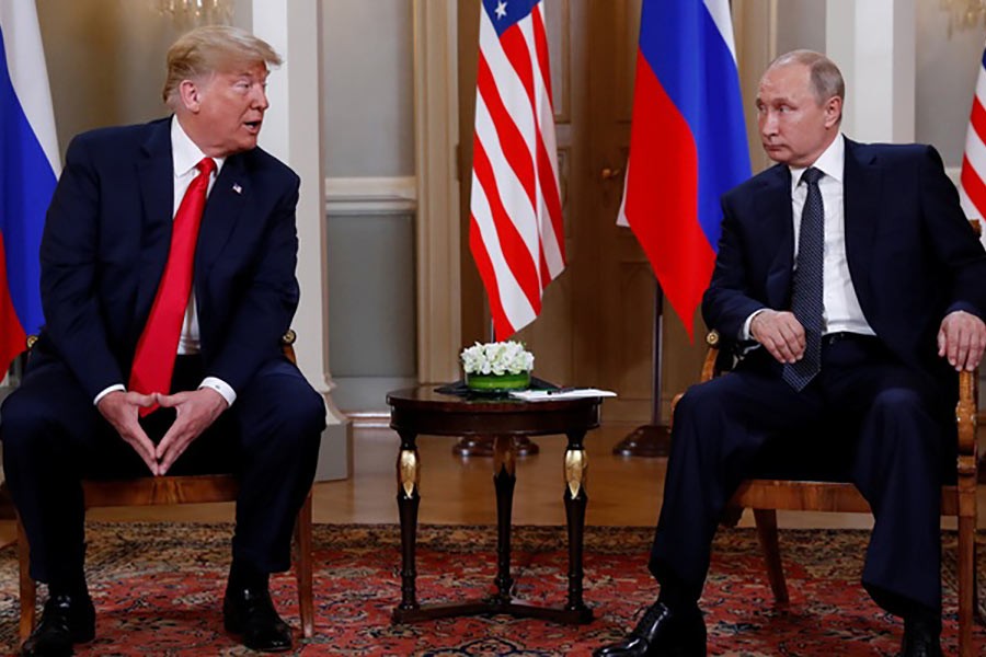 US President Donald Trump meeting with Russia's President Vladimir Putin in Helsinki of Finland on Monday. -Reuters Photo