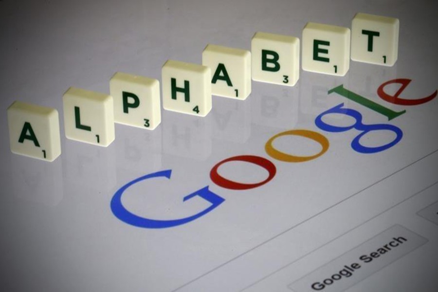 Letters spell the word "Alphabet" as they are seen on a computer screen with a Google search page in this photo illustration — Reuters