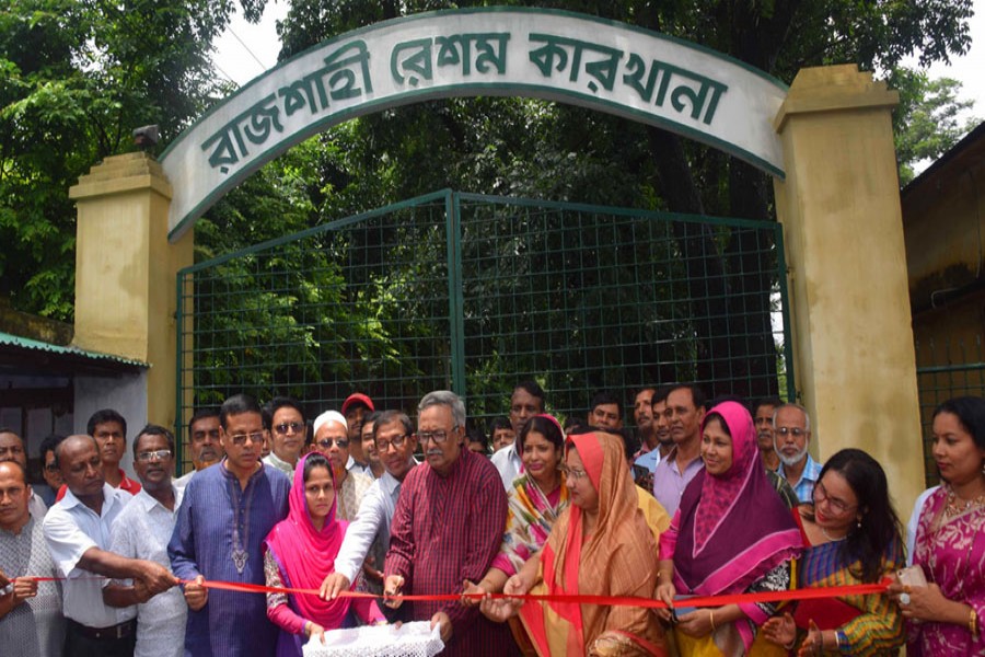 Fazley Hossain Badsha, MP, inaugurating operation of five looms of Rajshahi Silk Mills in Rajshahi on Friday      	— FE Photo